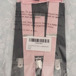 Baby Pink suspenders brand new never been opened.